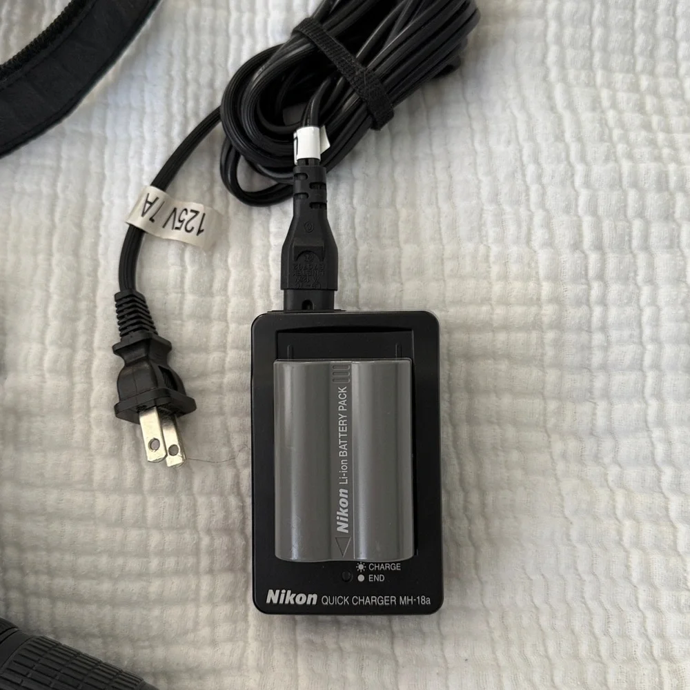 Nikon Black DSLR Camera with Lens and Charger